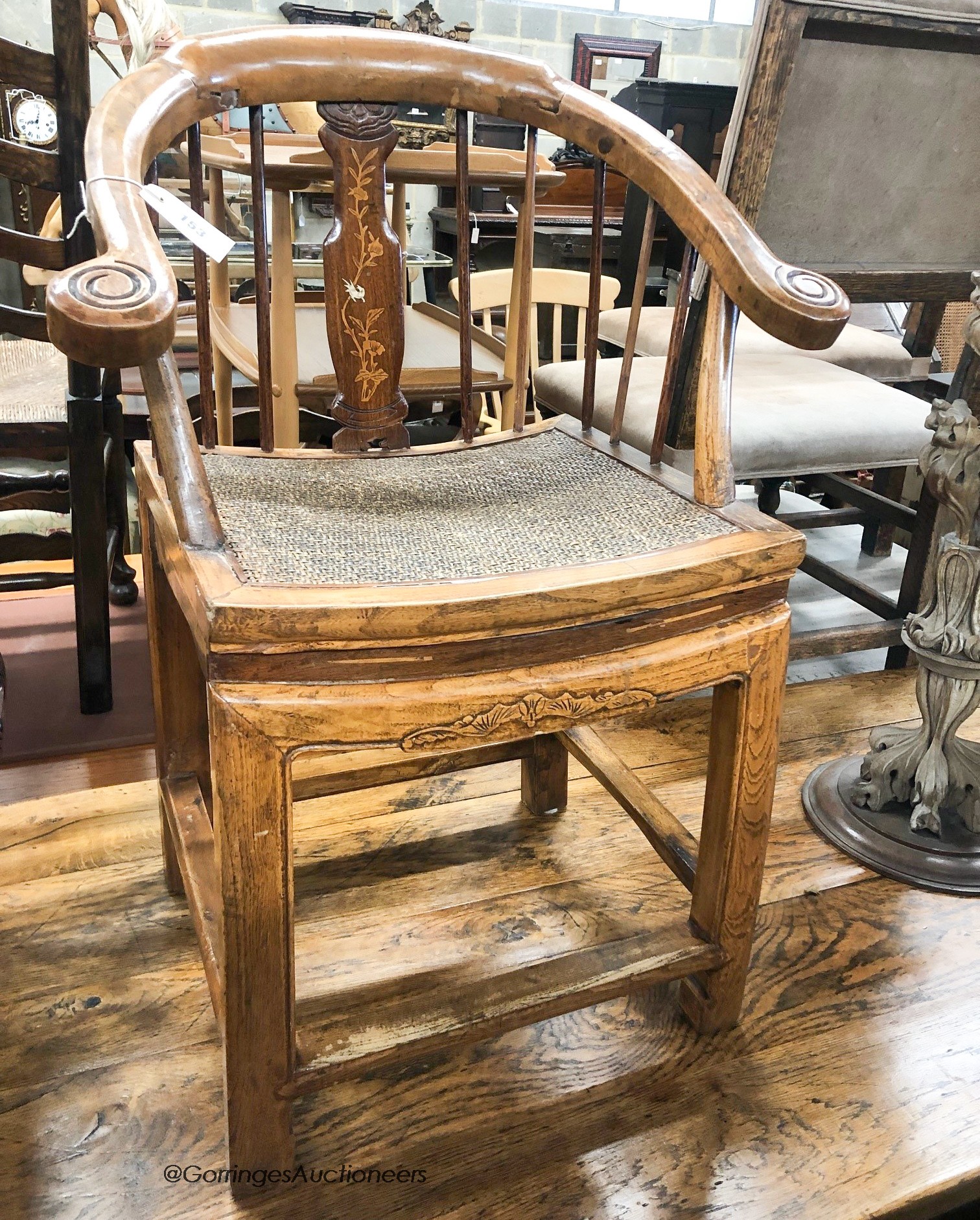 A Chinese elm stickback elbow chair, width 62cm, depth 42cm, height 86cm